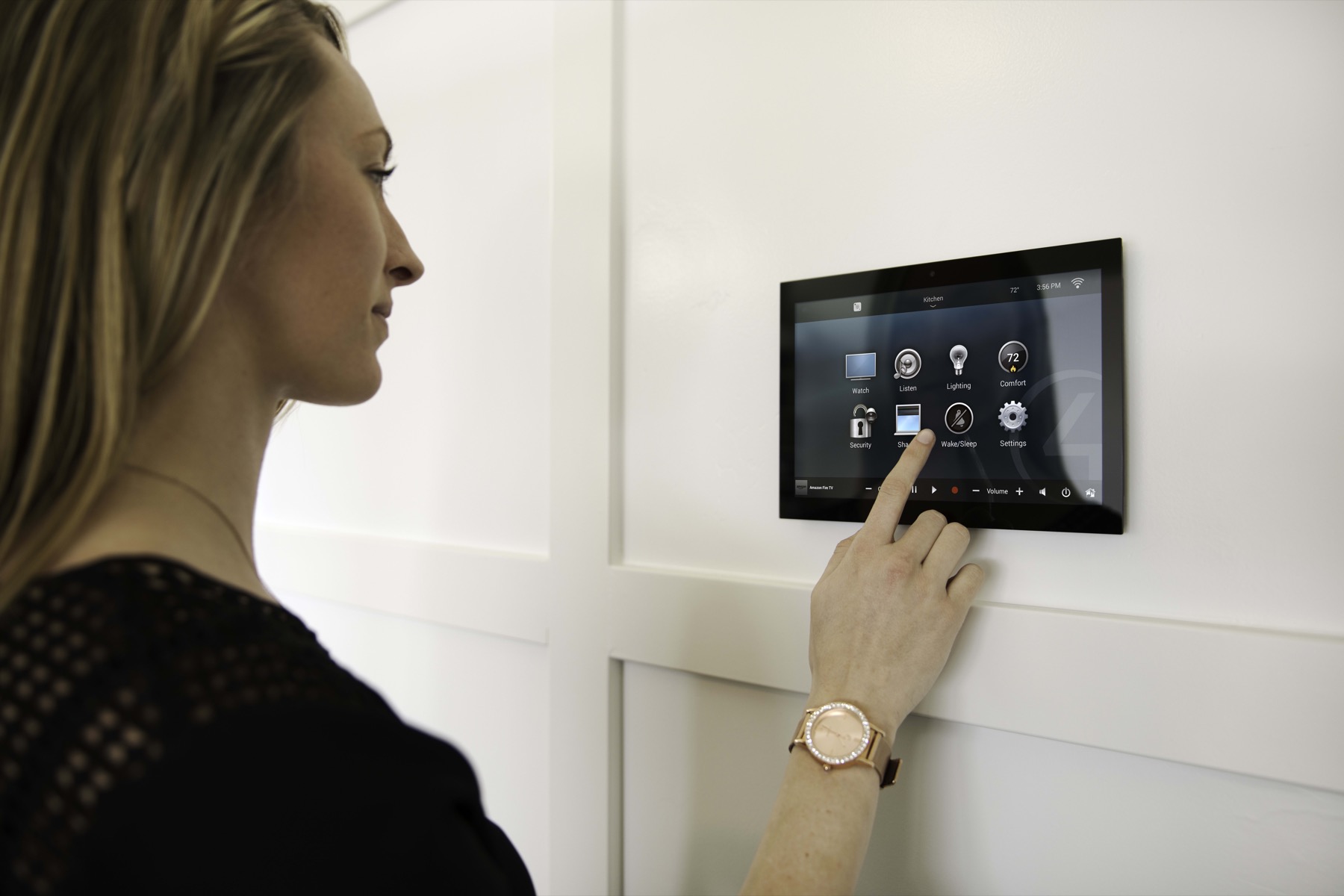 Control4 wall touchscreen showing integrated home controls