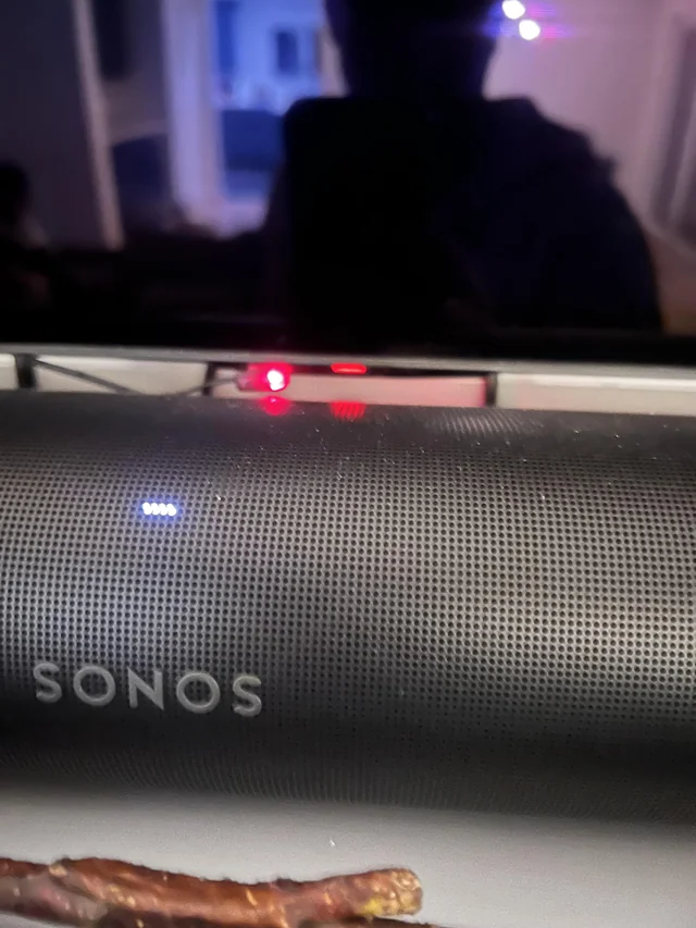 Infrared emitter positioned in front of a television sensor